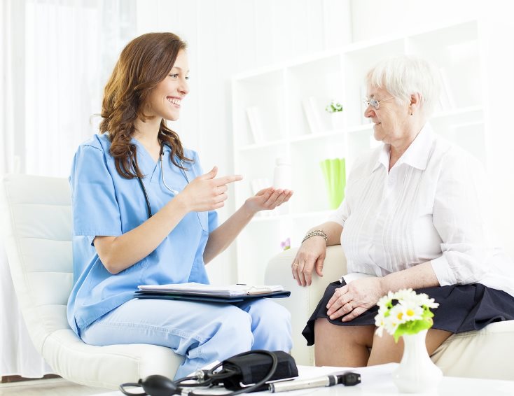 Nurse in empathetic conversation