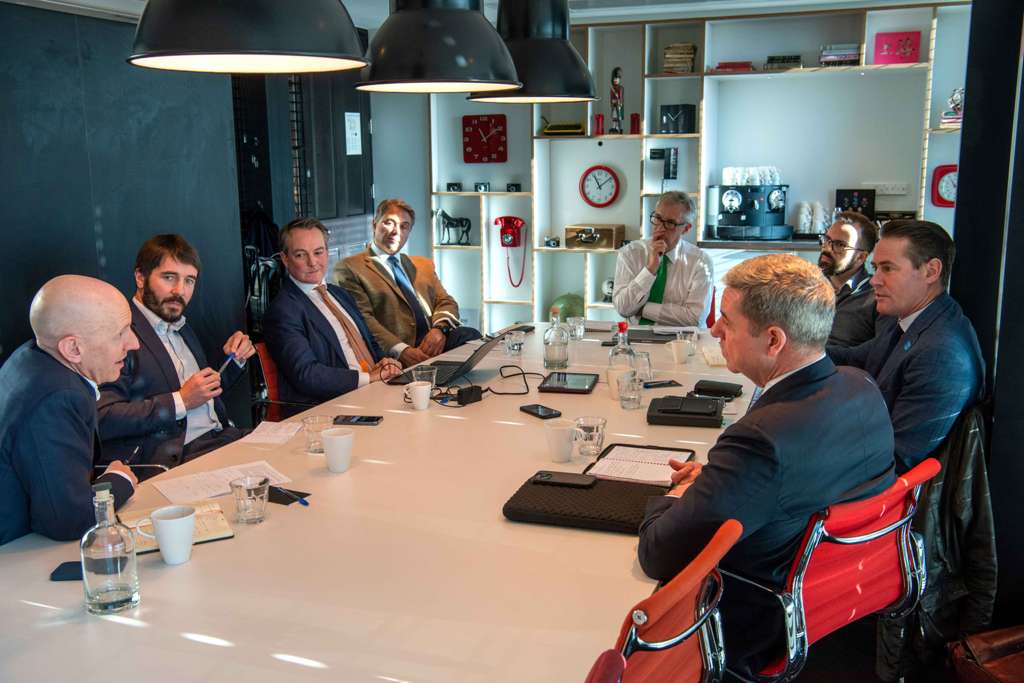 Boardroom meeting of fund managers
