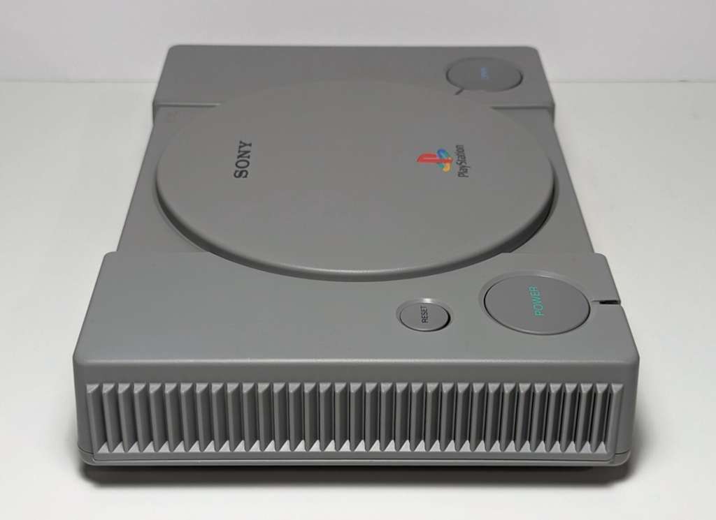 Sony PlayStation 1 console with disc tray and buttons